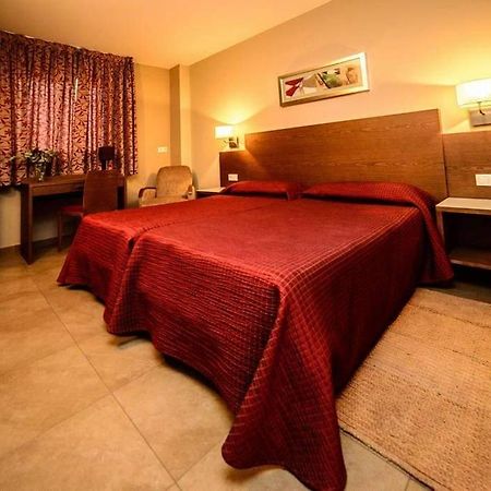 Hotel Ciutat De Carlet Bagian luar foto